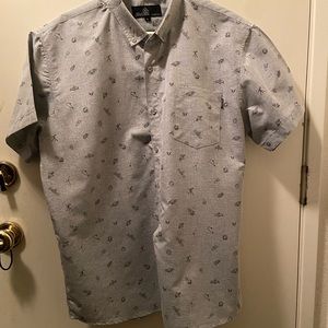 Mens button down shirt grey with space related print.